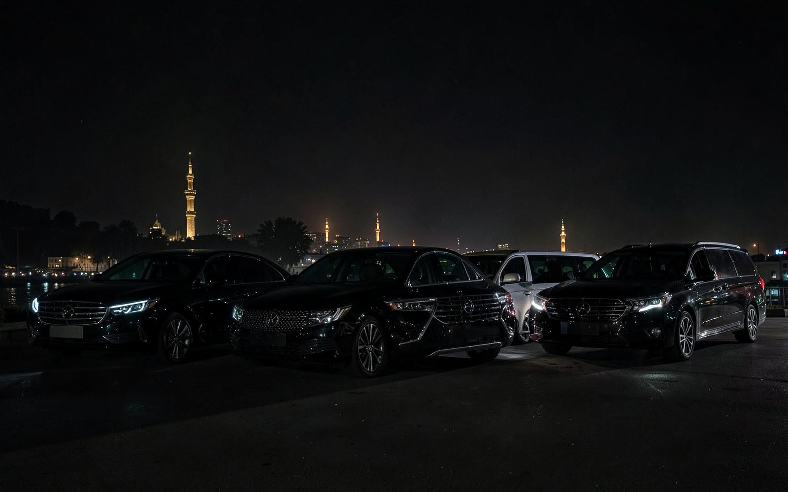 Modern Travel vehicles lined up at night in Cairo